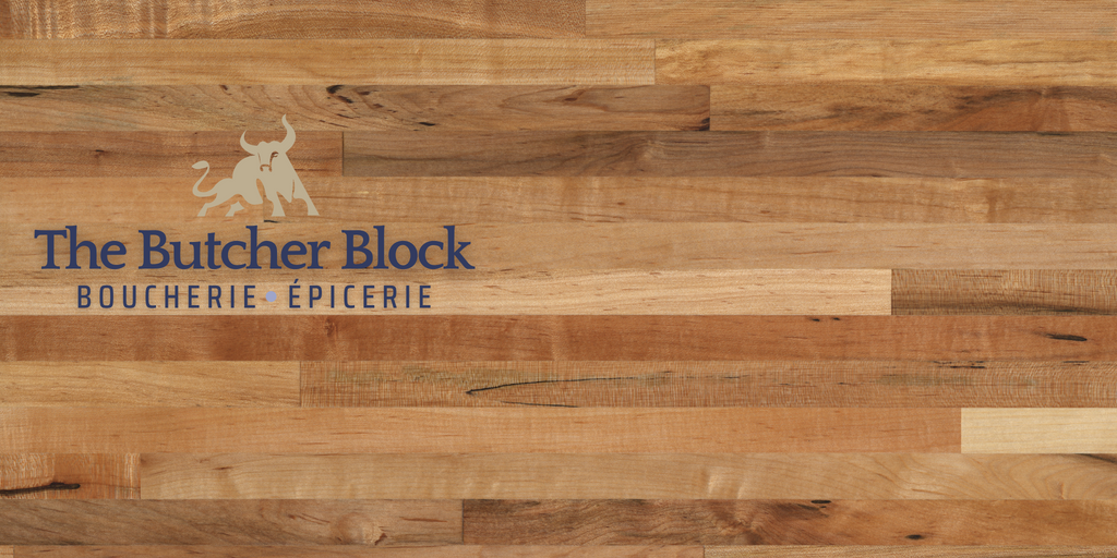 web banner with the butcher shop mauritius logo on butcher block wood