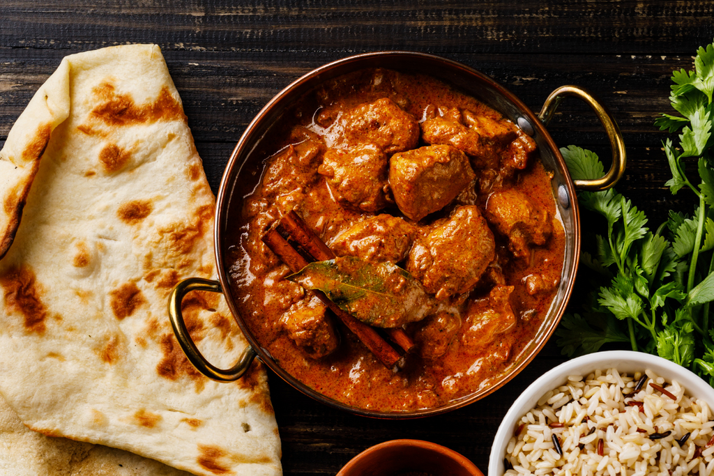 delicious venison curry served in a copper curry dish