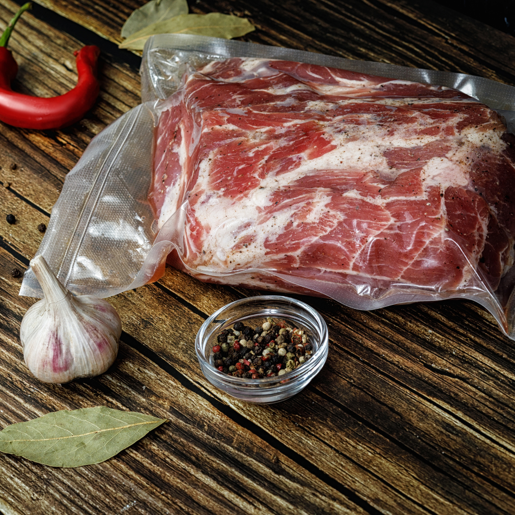 butcher block packaged meat in square share for header
